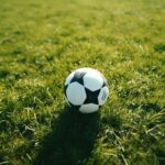Soccer Ball on Green Grass Field